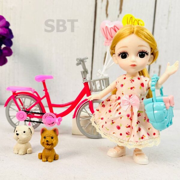 عروسک چشم تیله ای با دوچرخه وارداتی مامزنینی