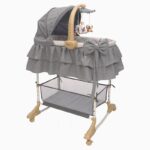 تخت و گهواره چند کاره ملورین همراه با آویز موزیکال مامزنینی